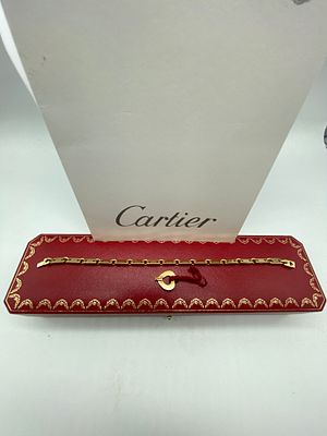 An 18ct yellow gold Cartier bracelet, comes with original certificates box and papers, comes 