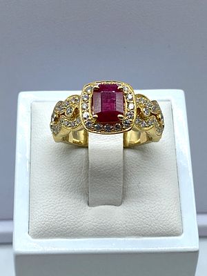An 18ct yellow gold ruby & diamond ring, 9 grams in weight approx, size R