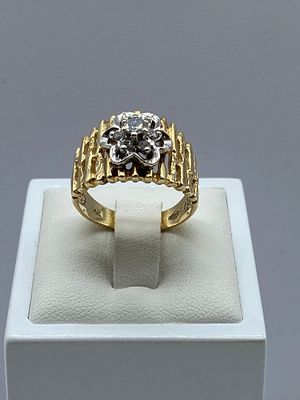 A 14ct yellow gold diamond daisy cluster ring, 7.1 grams in weight approx, size P