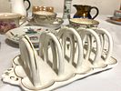 A mixed Victorian tea cups & toast rackImage - 7