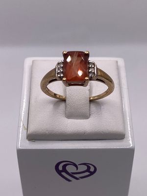 A 9ct yellow gold dress ring, semi precious stone with diamond shoulders, ring size N, approx 