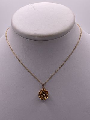 A 9ct yellow & rose gold pendant & chain,1.7 grams approx weight, 10mm pendant, on a 16 inch 