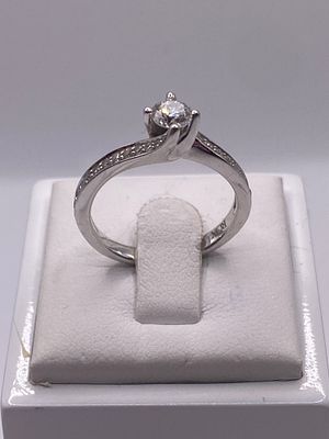 An 18ct white gold diamond ring, over .50ct diamonds, size I, approx weight 3.1 grams, like new 