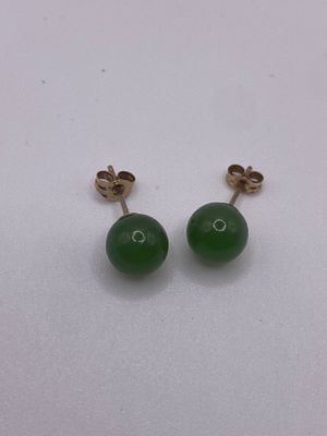 A pair of 9ct yellow gold jade earrings, 1.3 grams in weight approx, jade balls are 7mm approx