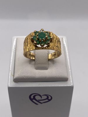 A 9ct yellow gold bark finished emerald dress ring, size M, approx weight is 3.3 grams