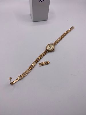 A 9ct yellow gold ladies everite watch, case is gold as is strap, combined weight includes 