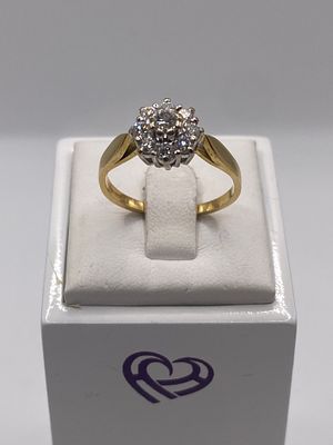 An 18ct yellow gold diamond cluster ring, approx 1ct total diamonds, approx weight is 3.2 grams 