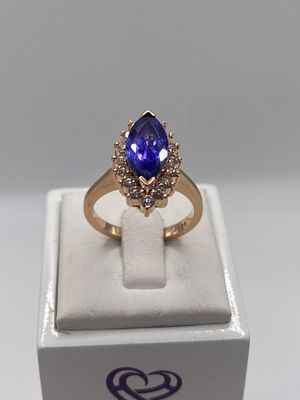 A 14ct rose gold tanzanite & diamond ring, approx triple A tanzanite stones, weight is 5.3 