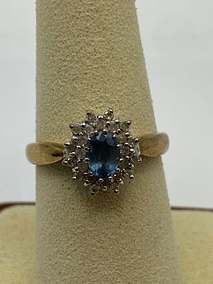A 9ct yellow gold aquamarine & diamond dress ring, 0.25ct of diamonds set in ring, size P, 3.7 