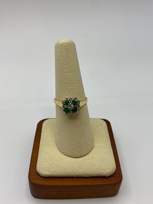 An 18ct yellow gold emerald & diamond dress ring, size P, 3.9 grams in weight approx