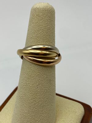 An 18ct tri colour gold Russian wedding band, hallmarked 750, size K, 7 grams approx weight