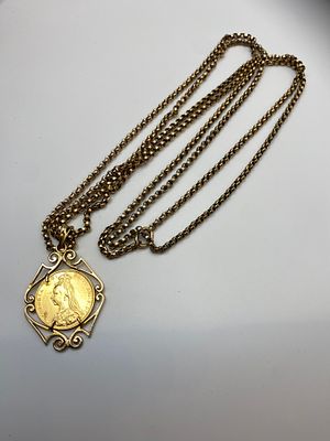 A full 22ct yellow gold sovereign complete with a 9ct yellow gold guards chain, guards chain is 