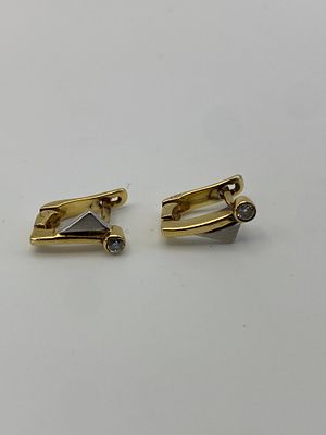 A pair of 18ct yellow & white gold diamond earrings, approx weight is 4.3 grams