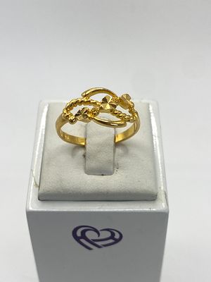 A 22ct yellow gold ring, size P, 3.1 grams in weight approx