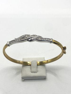A 9ct yellow & white gold bangle, cz stone set, 7.4 grams approx weight, very nice condition