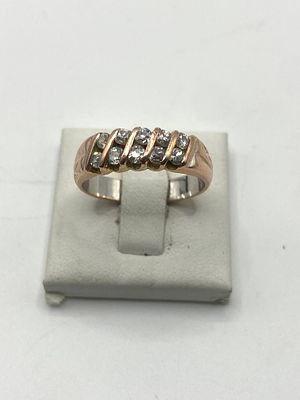 A 9ct rose & white gold dress ring, size O, approx weight 4.3grams, 2 rows of diamonds