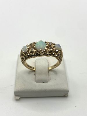A 9ct yellow gold opal & diamond dress ring, Size N, approx 2.9 grams weight