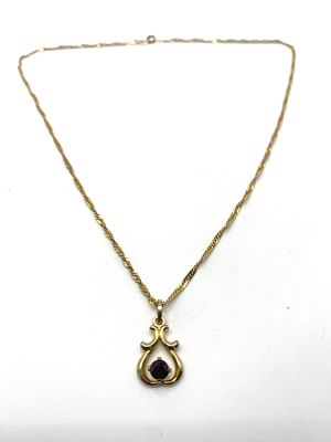 A 9ct yellow gold chain, chain is 18 inches long, approx weight is 2 grams, comes with a garnet 
