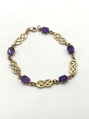 A 9ct yellow gold amethyst bracelet, 7 inches long, solid links, 8 grams approx weight