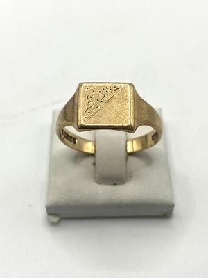 A 9ct yellow gold signet ring, size V, weight is 4.2 grams approx