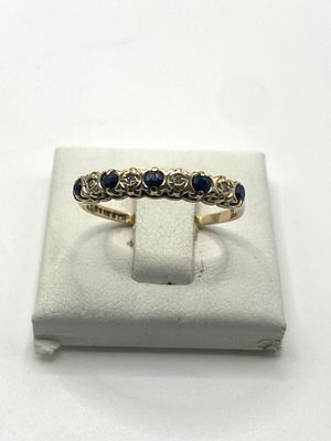 A 9ct yellow gold sapphire & diamond eternity style band, size K, approx 1gram in weight