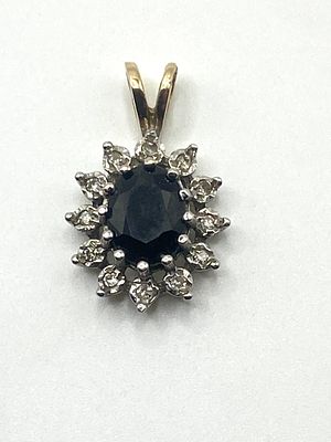 A 9ct yellow & white gold sapphire & diamond pendant, no chain, 1.5 grams approx weight, 20mm x 