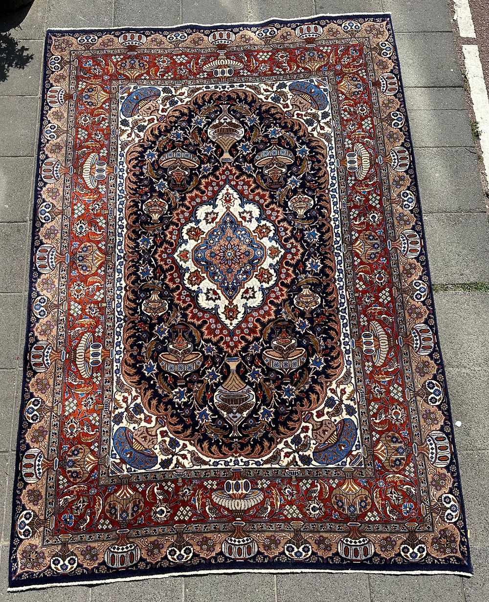 Mashhad. A vintage Persian Mashhad carpet, hand-knotted, circa 1990. Dimensions: 300*206 cm .