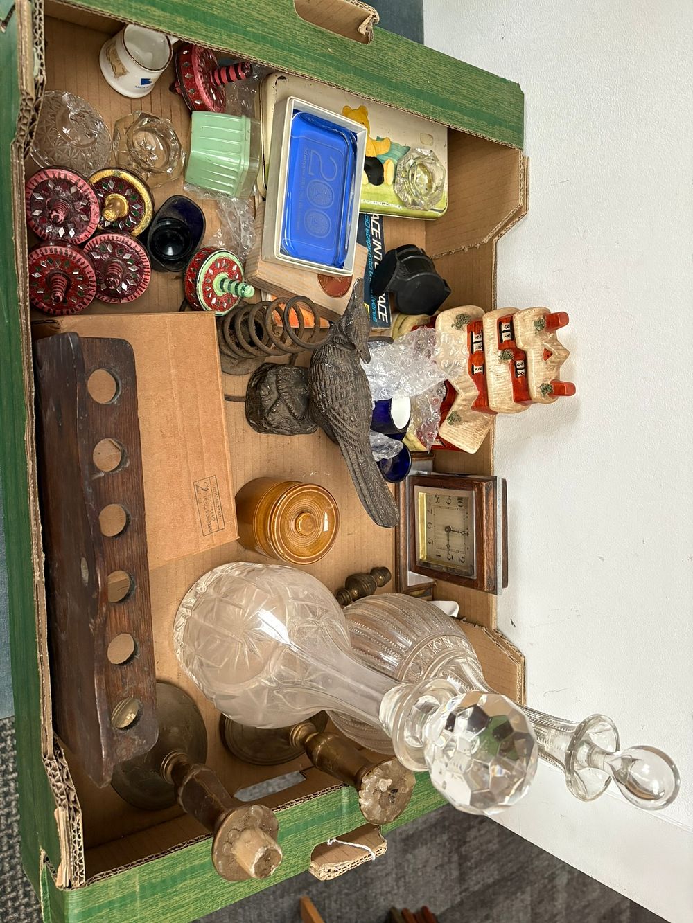 Lot 264: Box of miscellaneous items including glass decanters, bird,...