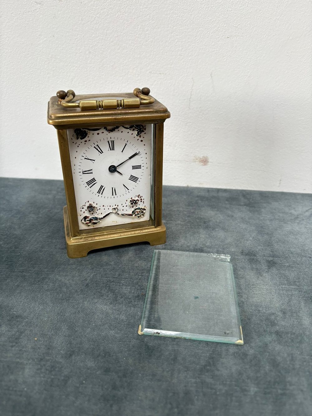 Lot 287: Brass carriage clock for restoration with raised decoration...