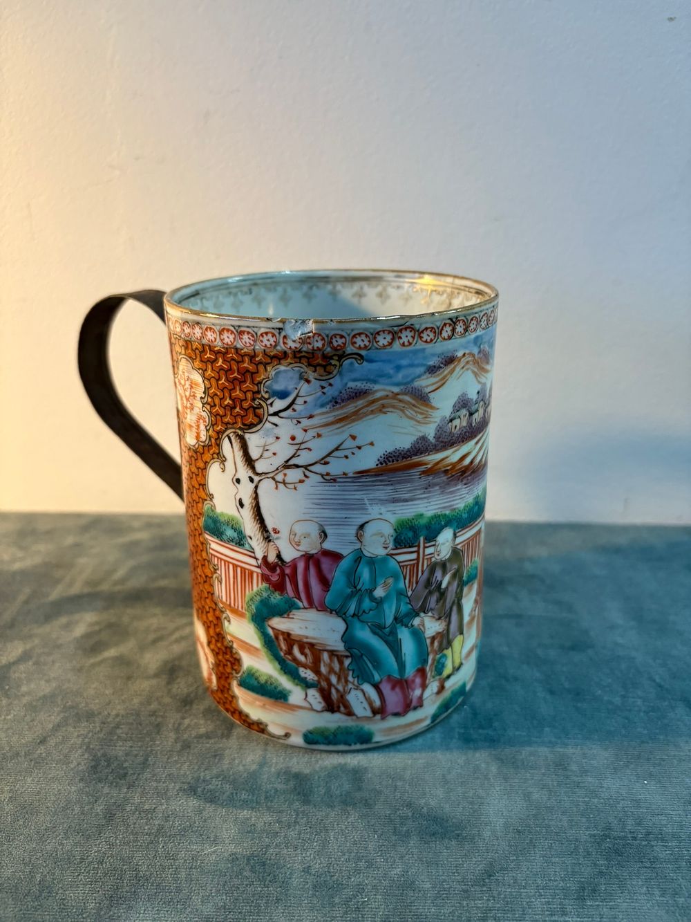Lot 289: Antique Chinese porcelain tankard with metal handle