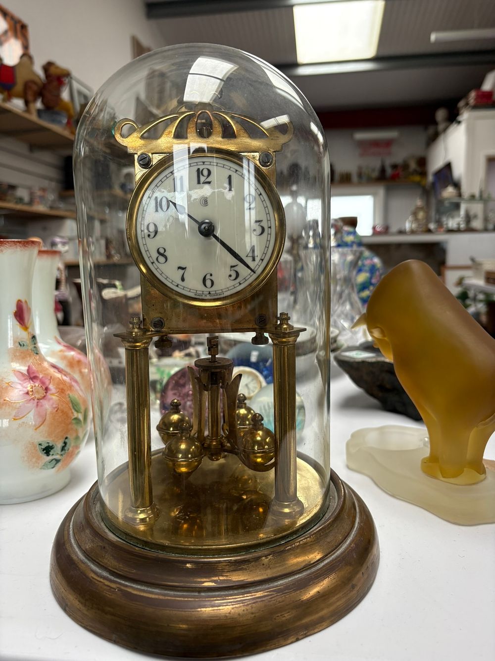 Lot 311: German Anniversary clock under glass dome - possibly...