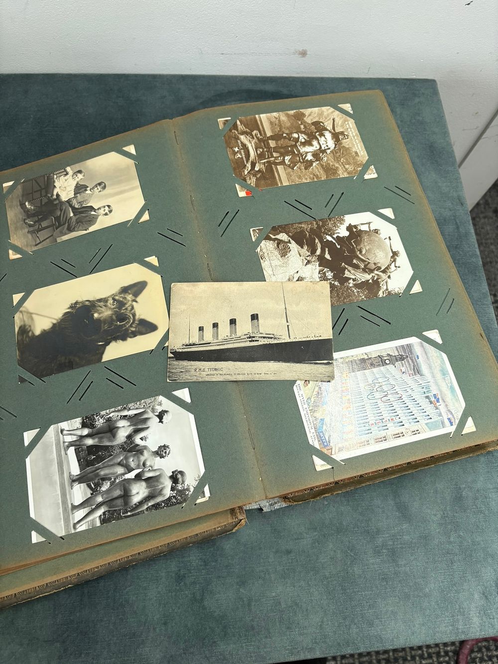 Lot 334: Large amount of postcards including military, Titanic, royal...