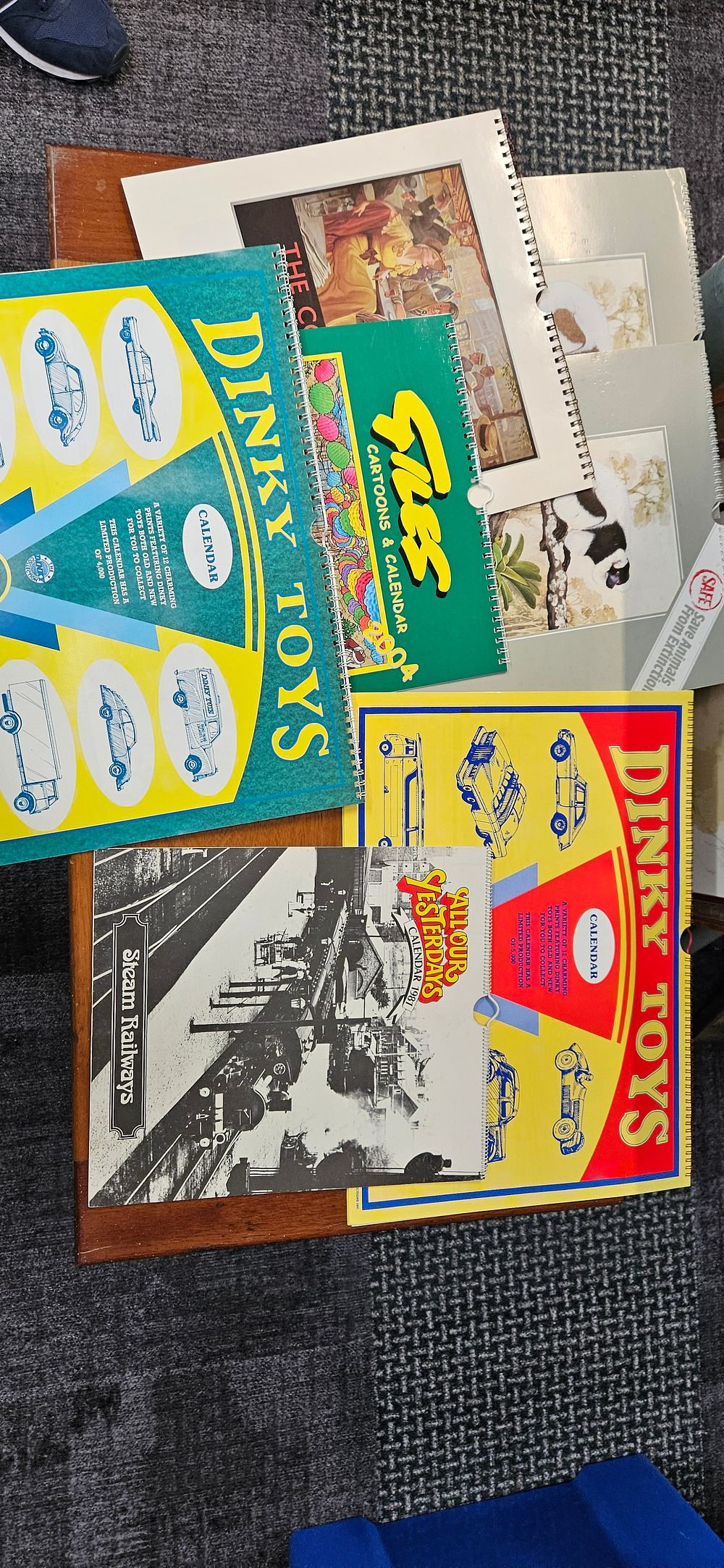 Lot 402: Vintage calendars including Dinky
