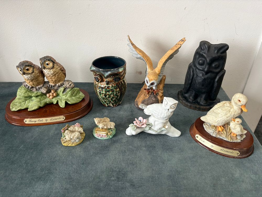 Lot 406: Assorted owl related ornaments including case iron, porcelain...