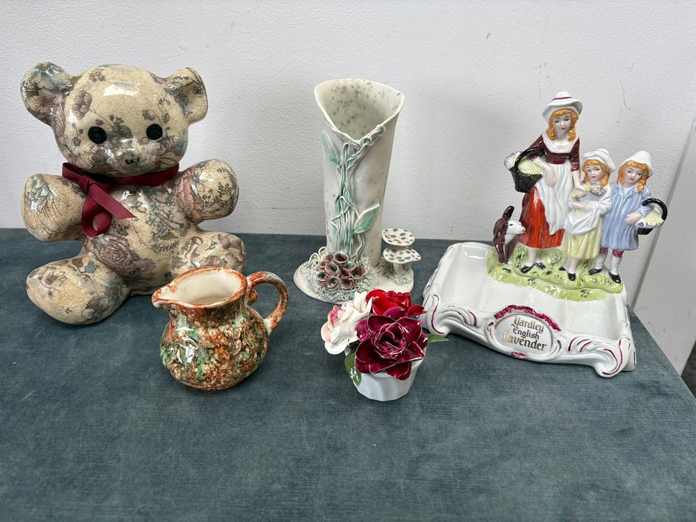 Lot 407: Ornaments including teddy, flowers, jug, vase and Yardley...