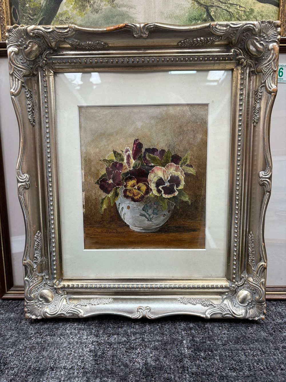 Lot 719: Still life painting of flowers in silver frame