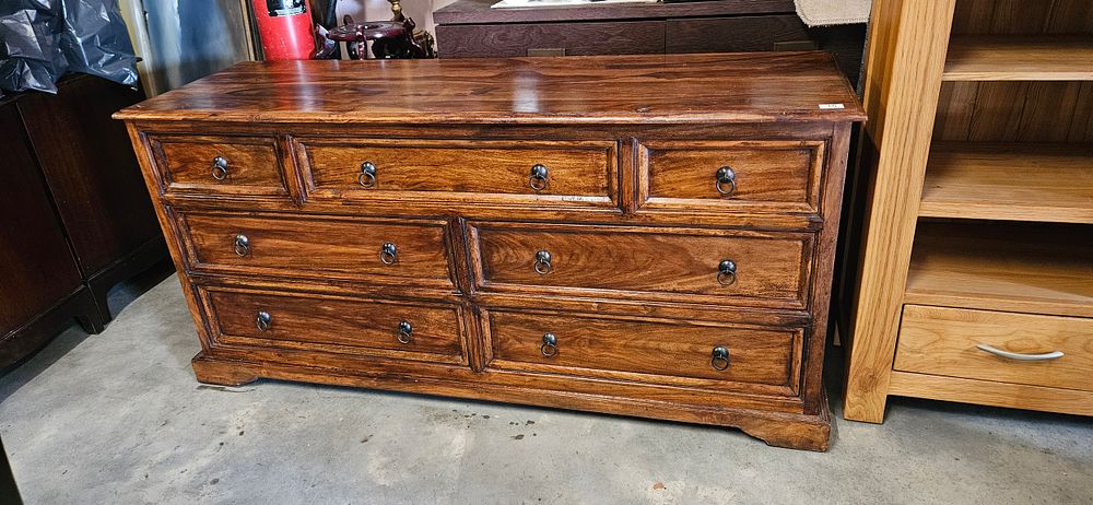 Lot 15: Solid wood very heavy seven-drawer chest of drawers