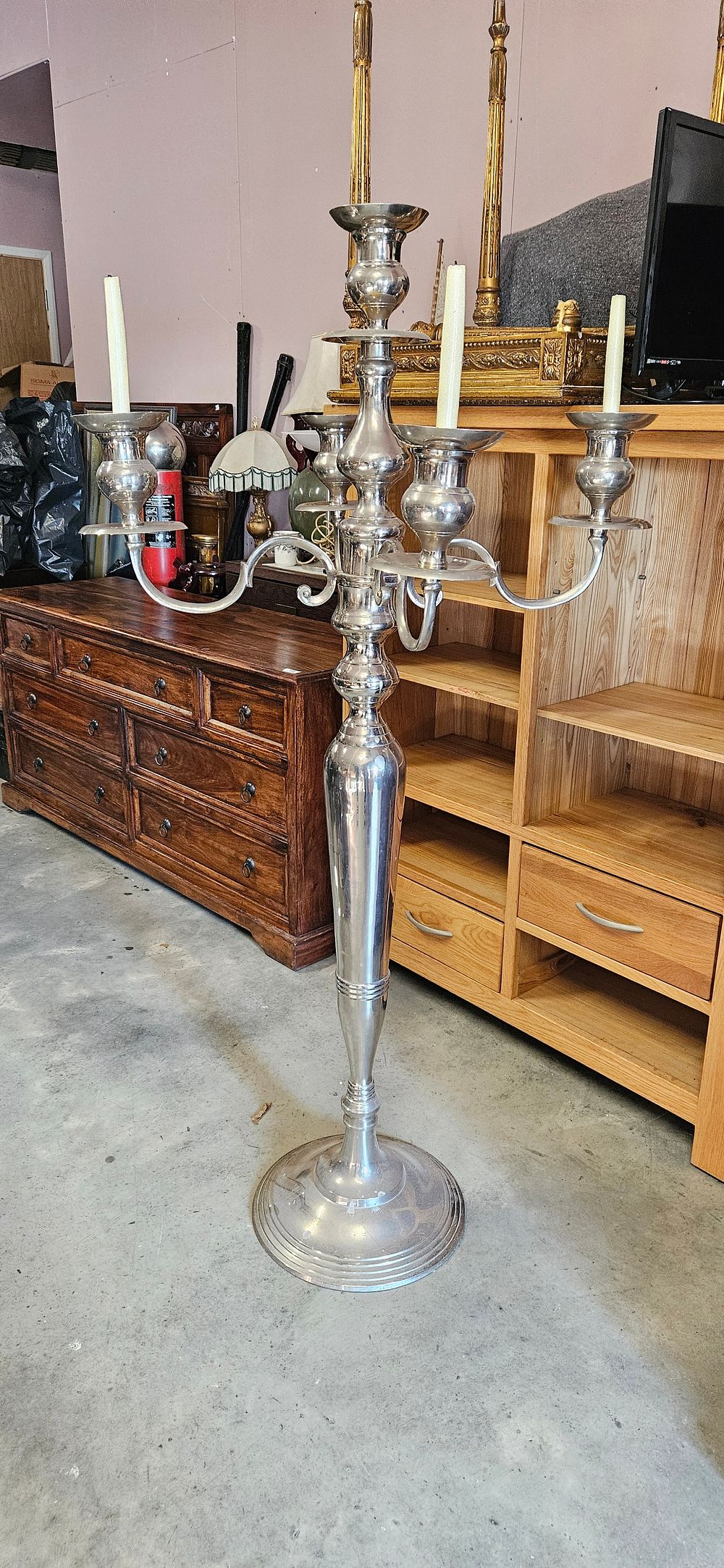 Lot 16: Tall five-arm silver-toned floor candelabra