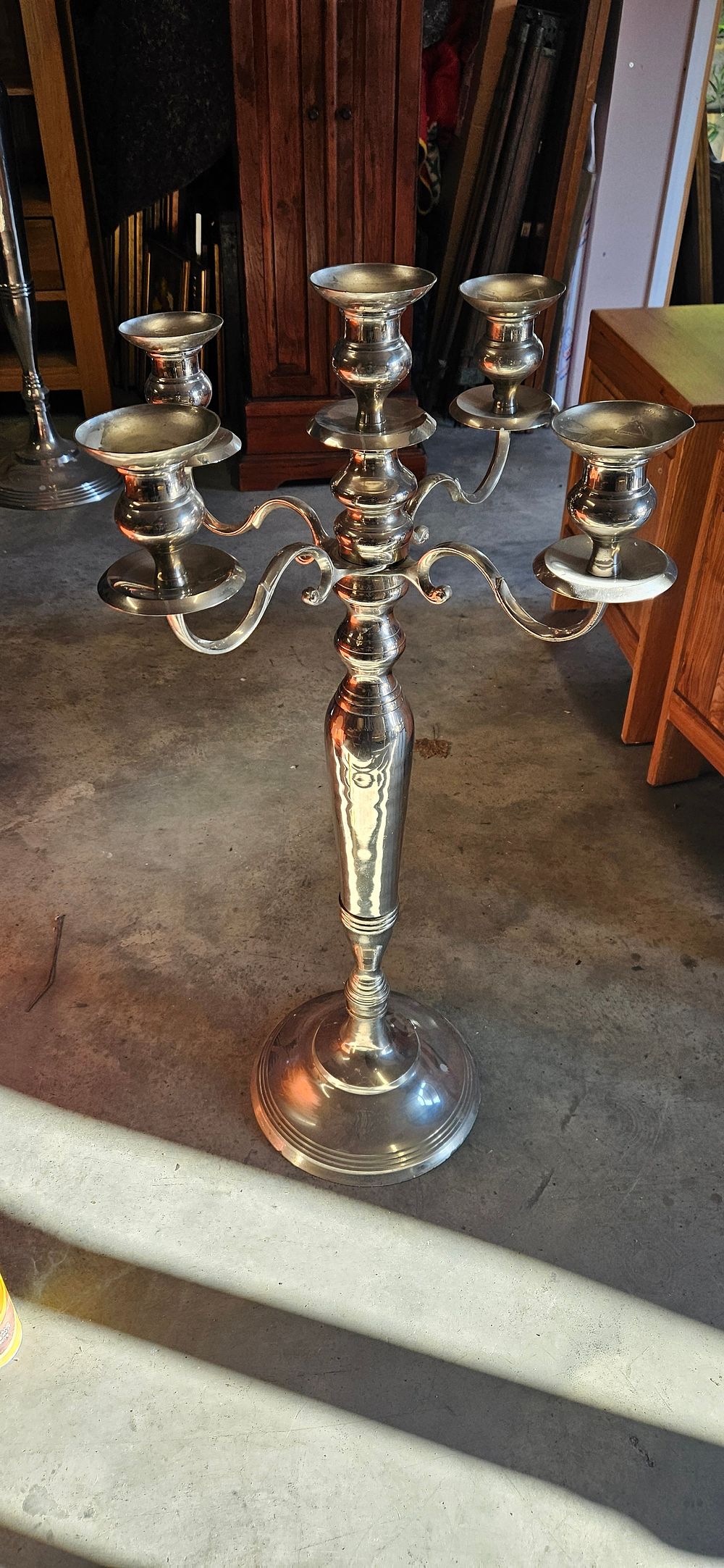 Lot 17: Five-arm silver-toned floor candelabra