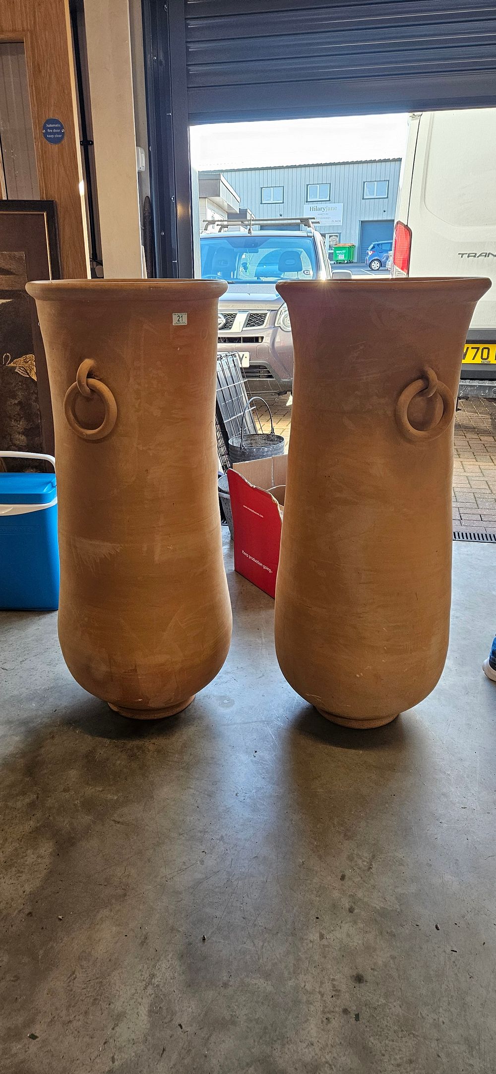 Lot 21: Very large pair of oversized terracotta Italian planters/...