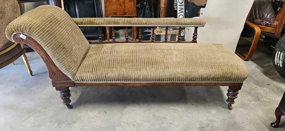 Lot 23: Antique Victorian mahogany chaise longue with a scrolled...