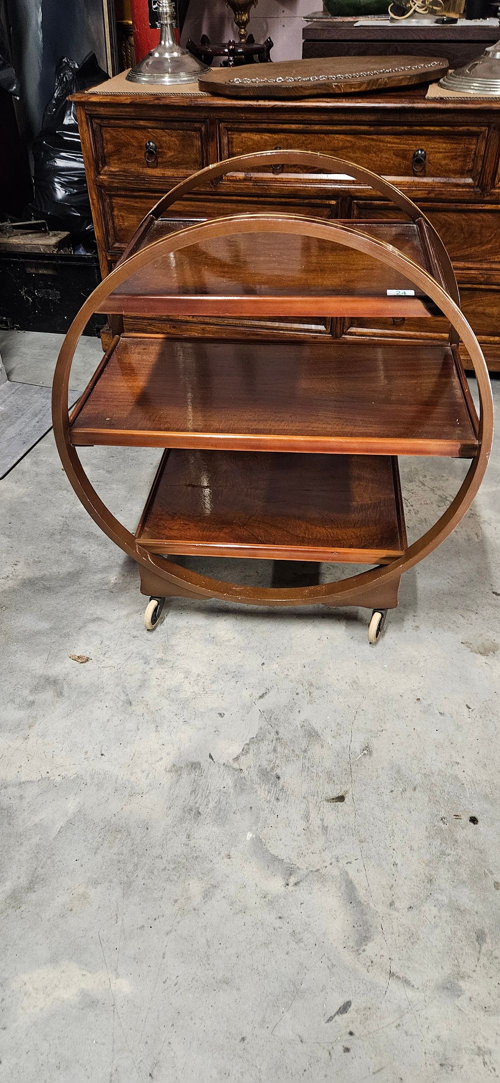 Lot 24: English Art Deco three-tier circular drinks trolley with...
