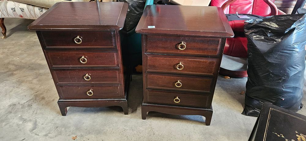 Lot 48: Pair of stag four drawer bedside cabinets