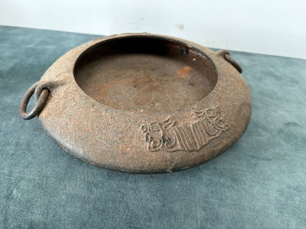Lot 179: Heavy metal oriental bowl with circular handles
