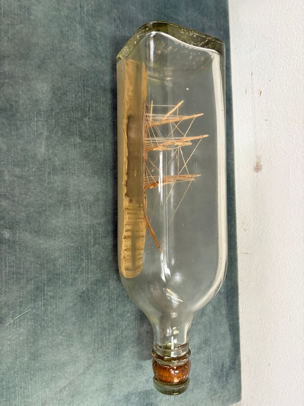 Lot 186: Vintage ship in a bottle - missing stand