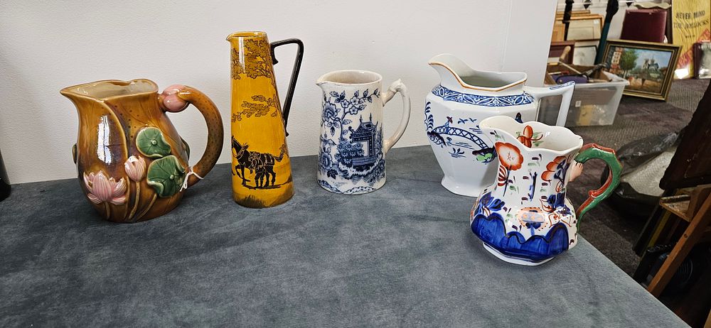 Lot 199: Collection of five ceramic jugs - Majolica, Royal...