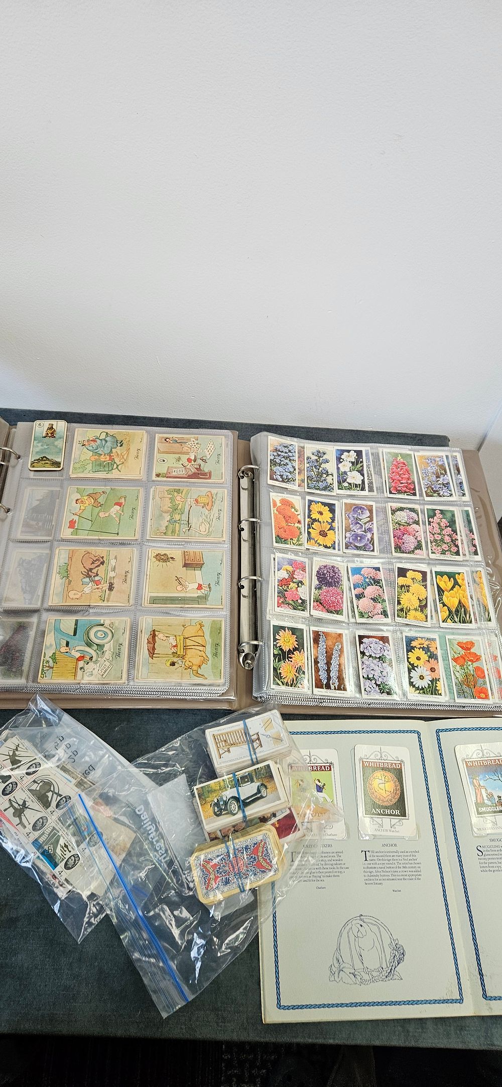 Lot 206: Collection of various cigarette cards including - Henry,...