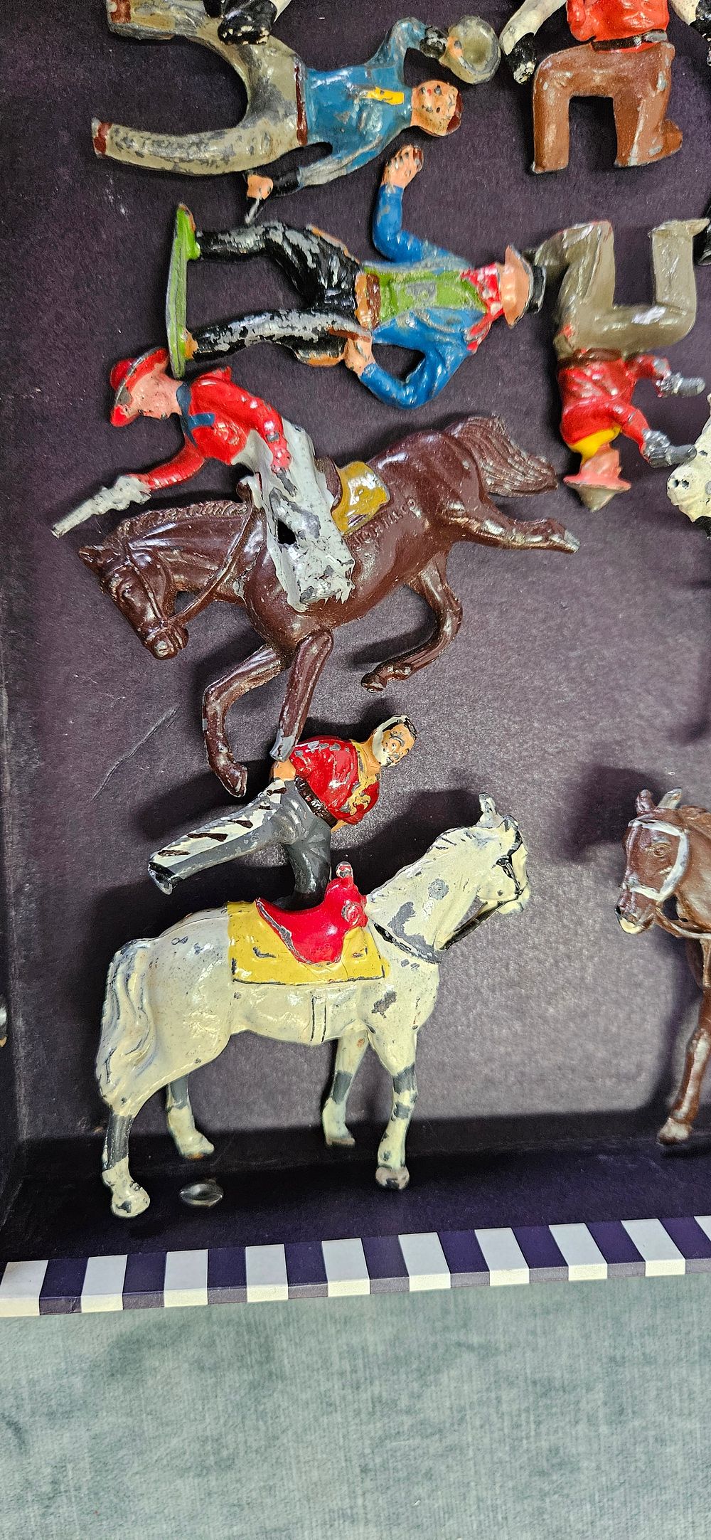 Lot 239: Timpo/ Johillco? metal toy cowboy figures
