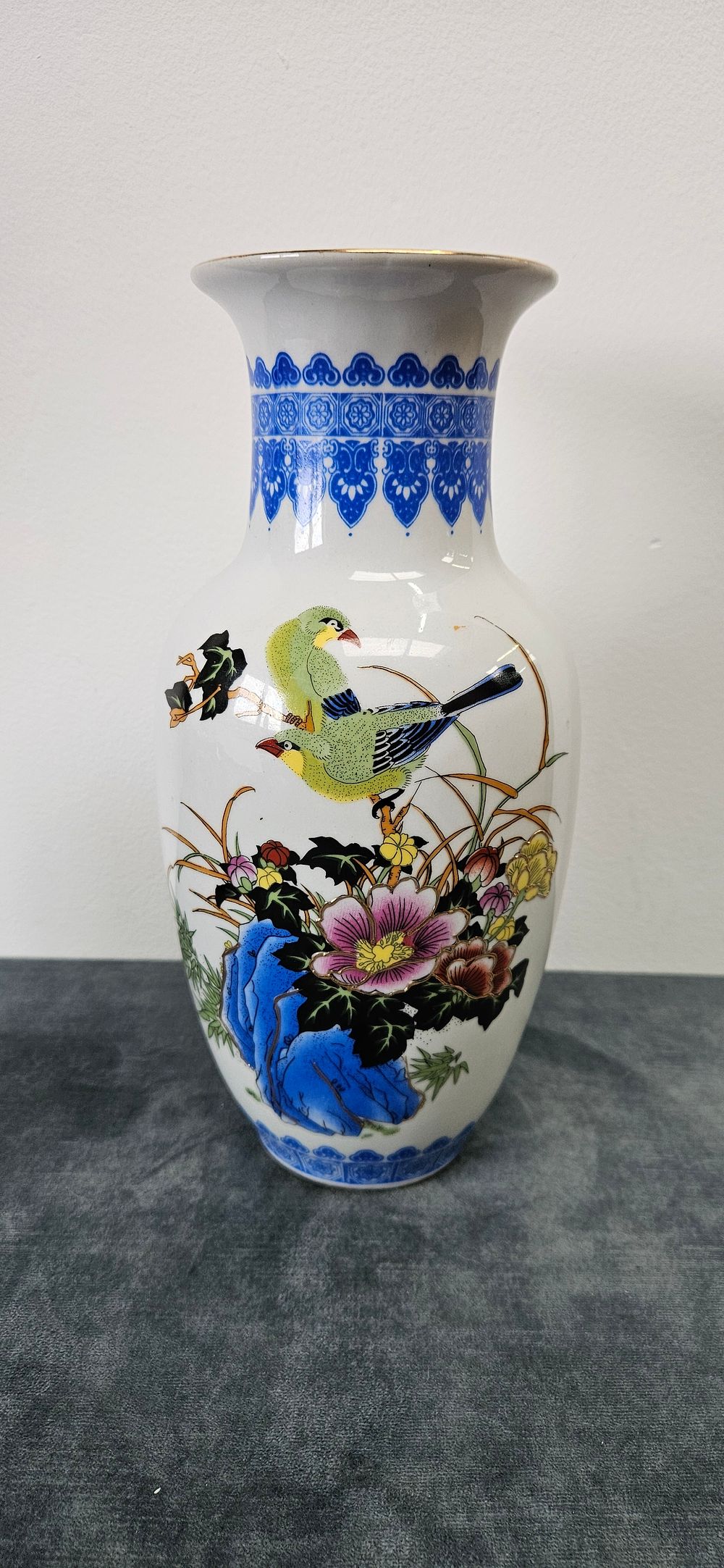 Lot 418: Asian porcelain vase with bird and floral motifs.