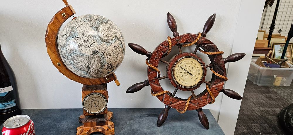 Lot 419: Nautical ships wheel barometer and globe on wooden...
